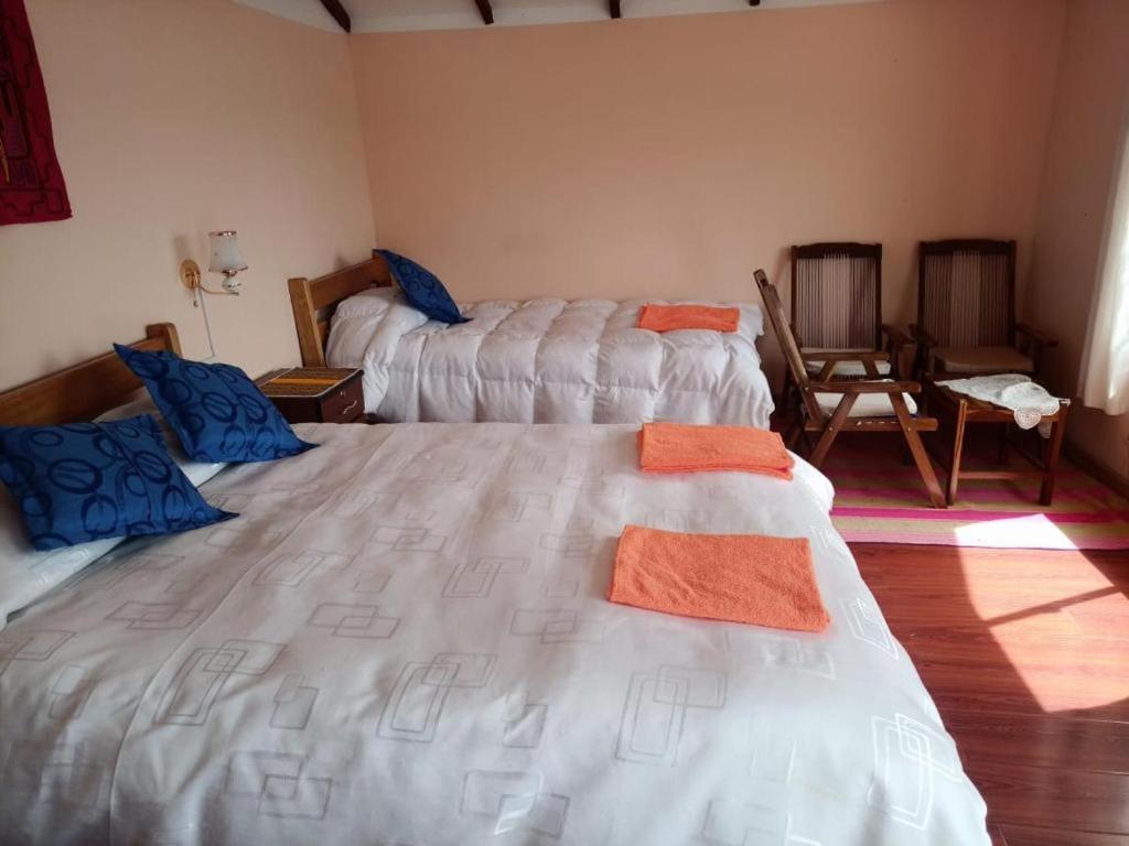Hostal Inca Uma Comunidad Yumani Buitenkant foto