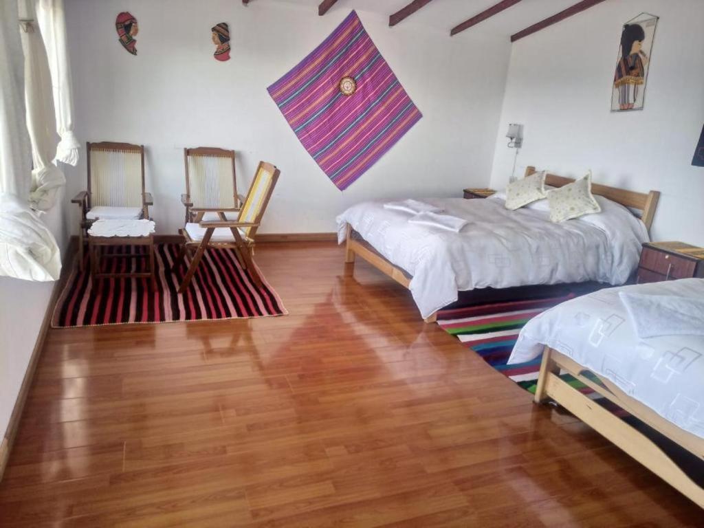 Hostal Inca Uma Comunidad Yumani Buitenkant foto
