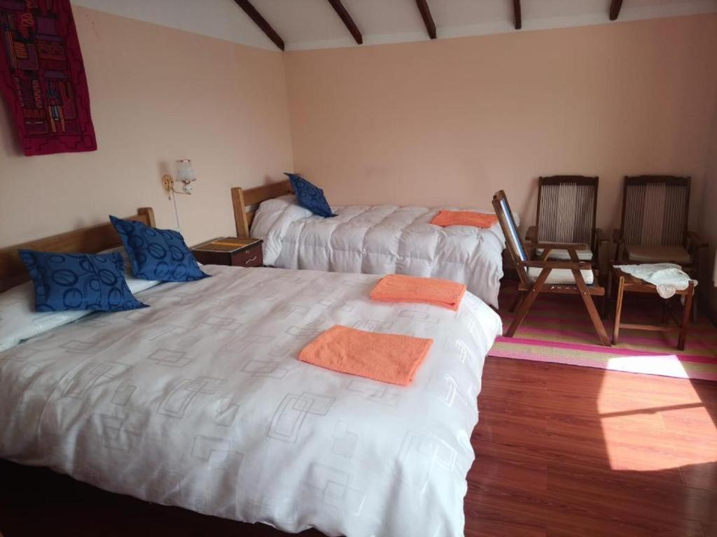 Hostal Inca Uma Comunidad Yumani Buitenkant foto