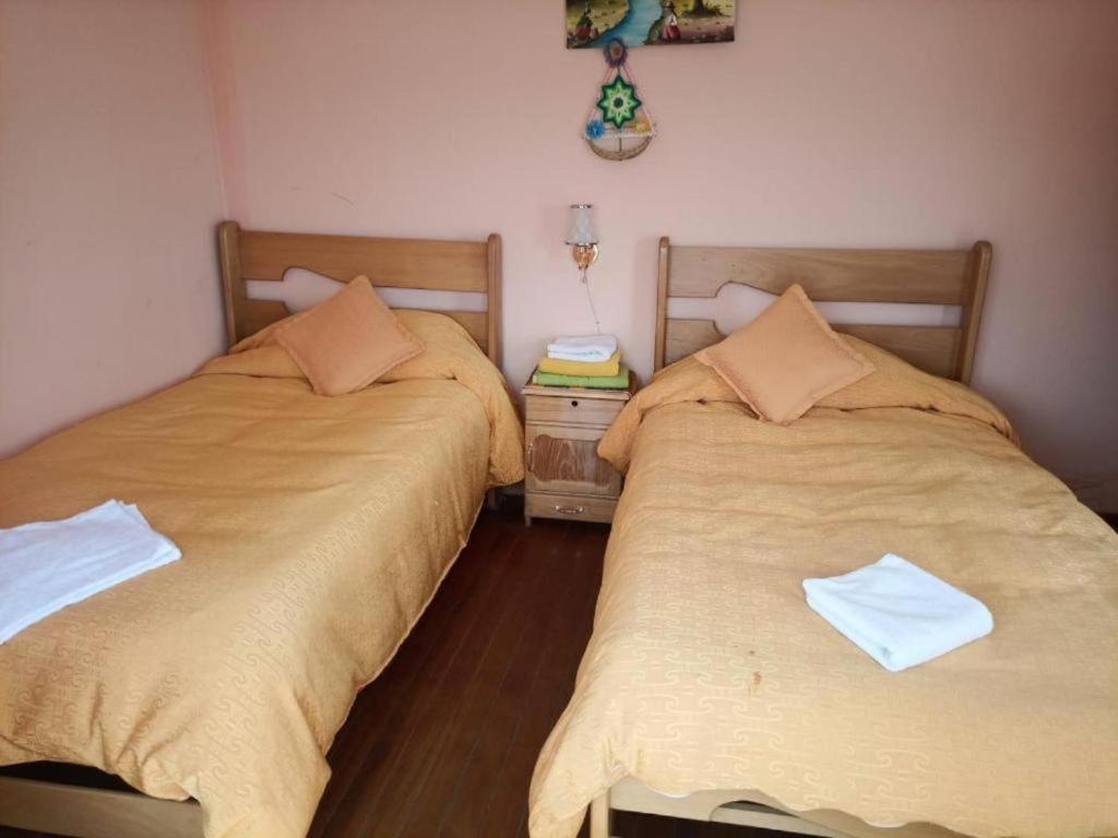 Hostal Inca Uma Comunidad Yumani Buitenkant foto